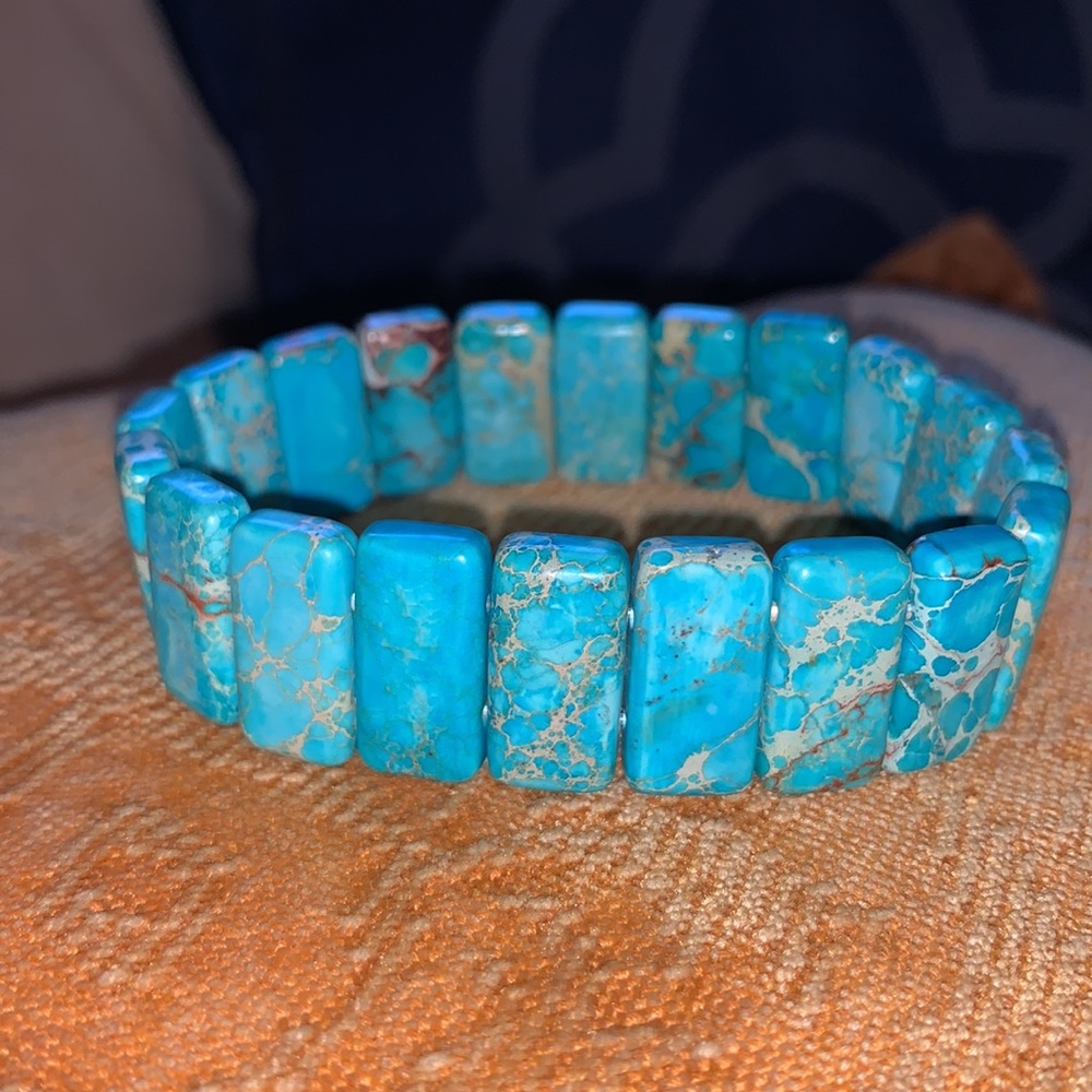 Turquoise colored polished stone bracelet